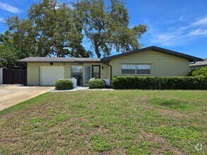 Building Photo - Live the Florida Lifestyle – Turnkey 2BR H...