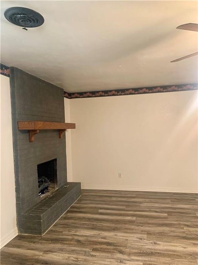 Building Photo - Charming Home with Open Kitchen, Fireplace & 2-Car Garage