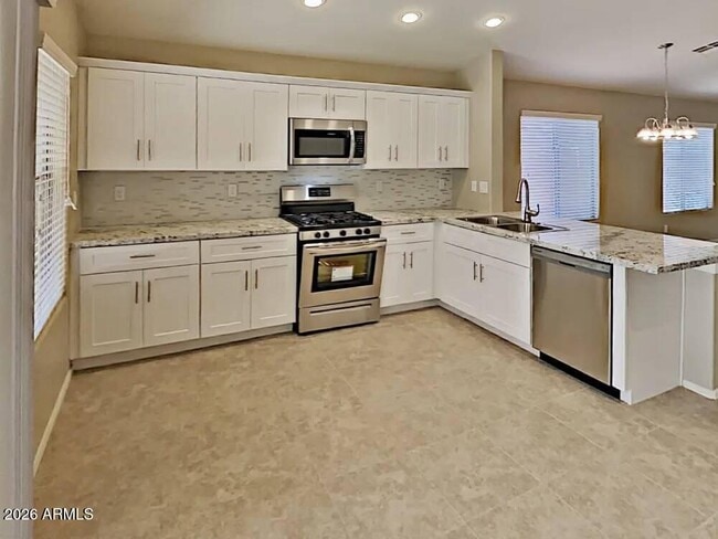 Building Photo - 12759 W Desert Mirage Dr
