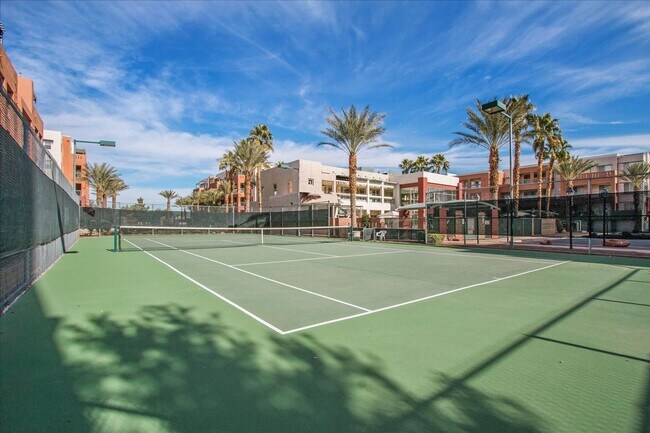 Building Photo - Top level 2 bedroom condo located in guard...
