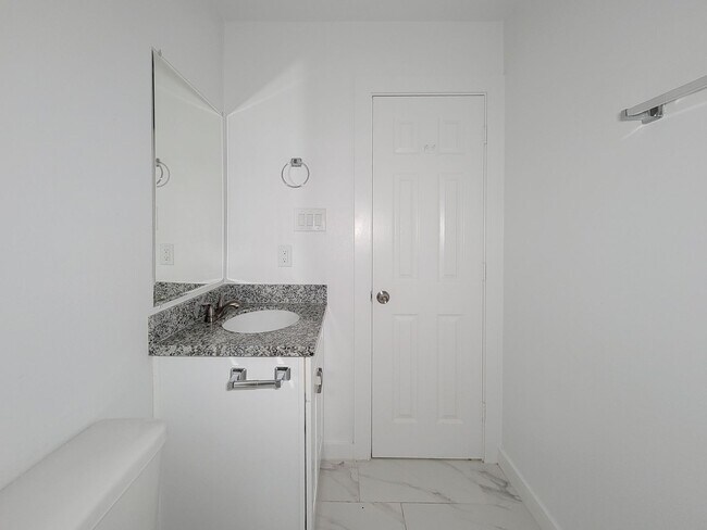 Building Photo - This newly constructed 3-bedroom, 2-bathroom unit offers modern living with 1,150 sq ft of space....