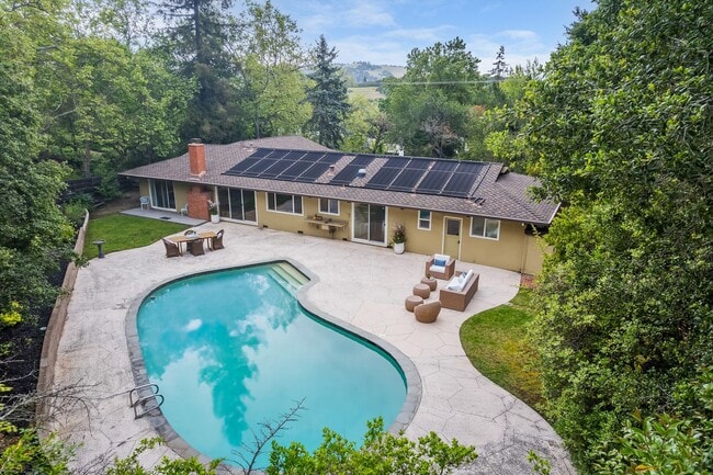 Building Photo - Updated 3 bedroom + office & pool, single ...