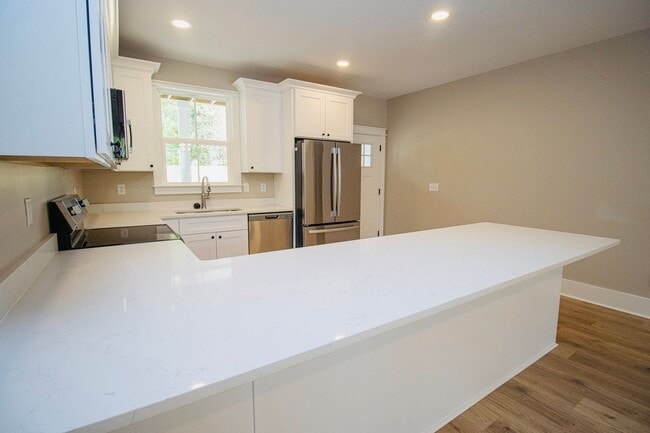 Building Photo - "Welcome to Olympia – Brand New Units! Spe...