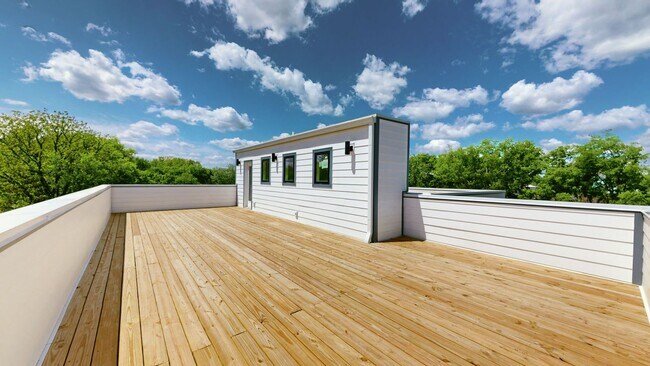 Building Photo - NEW BUILD with Rooftop!