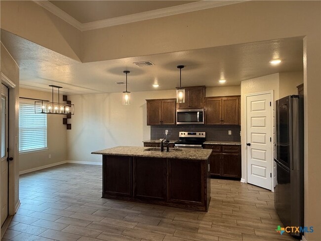 Building Photo - 7702 Blue Nile Dr