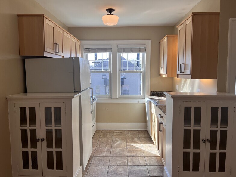 Bright fully remodeled kitchen with granite countertops - 210 S Laurel St