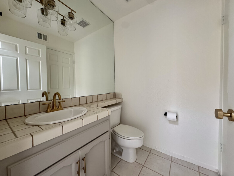 Downstairs half bath - 983 E Foxhill Dr