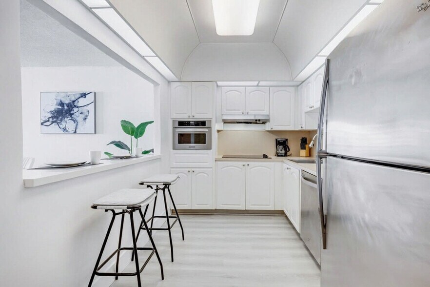 Building Photo - 19370 Collins Ave