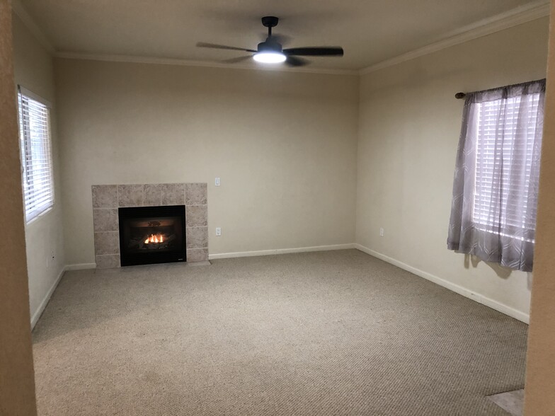 Living room with gas fire place - 10001 Woodcreek Oaks Blvd