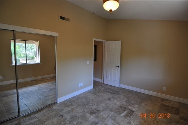 Primary Bedroom with glass sliding doors - 13059 Lincoln Way