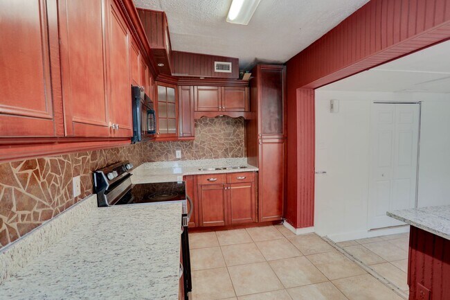 Building Photo - 7608 Simms Ave