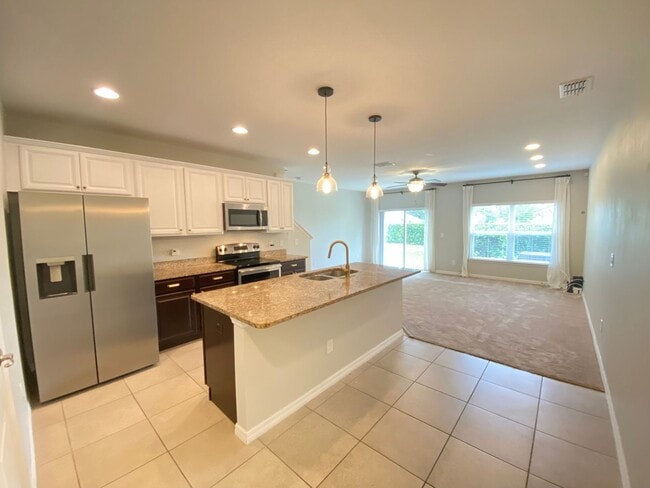 Building Photo - WINTER SPRINGS!  TUSCANY PLACE TOWNHOME - ...