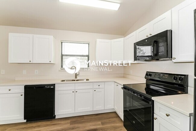 Building Photo - 4 Bedroom Pet-Friendly Home in Lehigh Acres, FL with Main Street Renewal