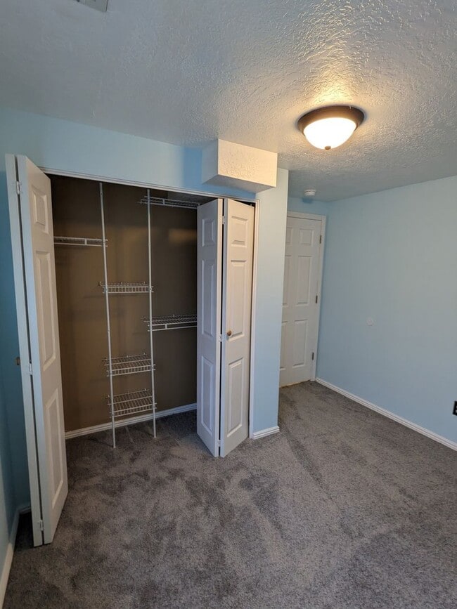 Building Photo - $1,800 Rent Credit! Spacious 5-Bed Clearfield Home with Garage & Fenced Yard