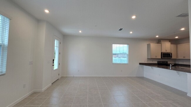 Building Photo - Brand-New Apopka 4Bed/2.5 Bath Townhome Avail for Rent! Be The first to Live Here!