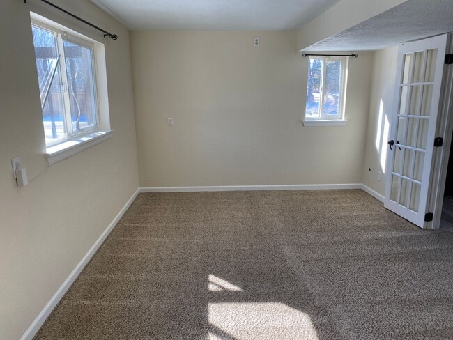 Building Photo - Great corner lot home backing up to open s...