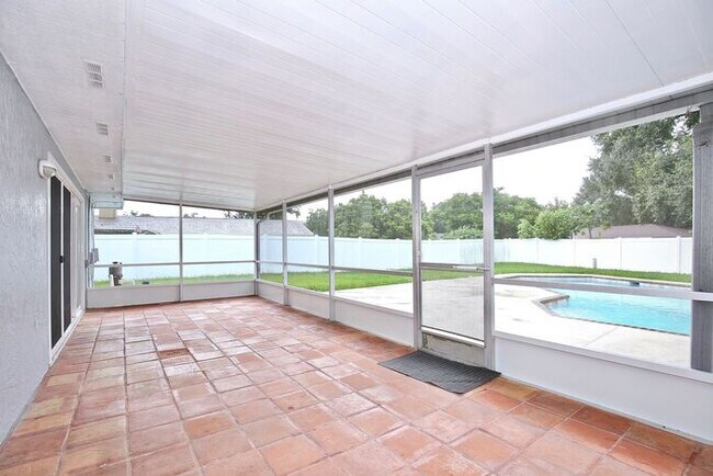 Building Photo - Gorgeous 4/2 Pool Home with a Covered Patio and a Large Fenced Backyard Located in Dr. Phillip's ...