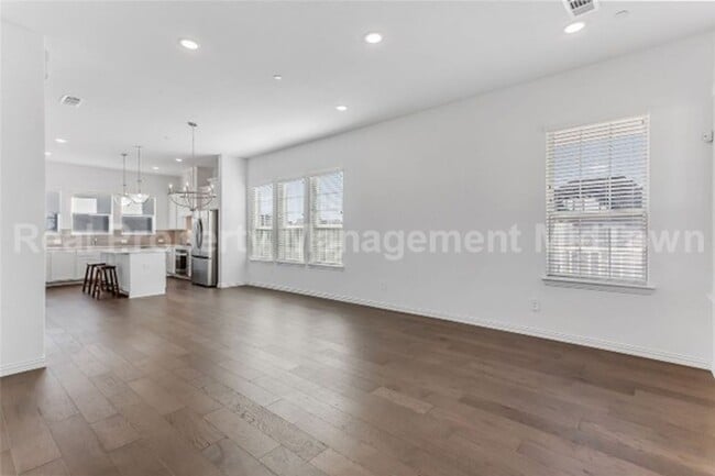Building Photo - Live Elevated in the Heart of Viridian – S...