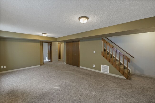 Building Photo - Spacious 4-Bedroom Home with Finished Basement, Large Deck & 2-Car Garage