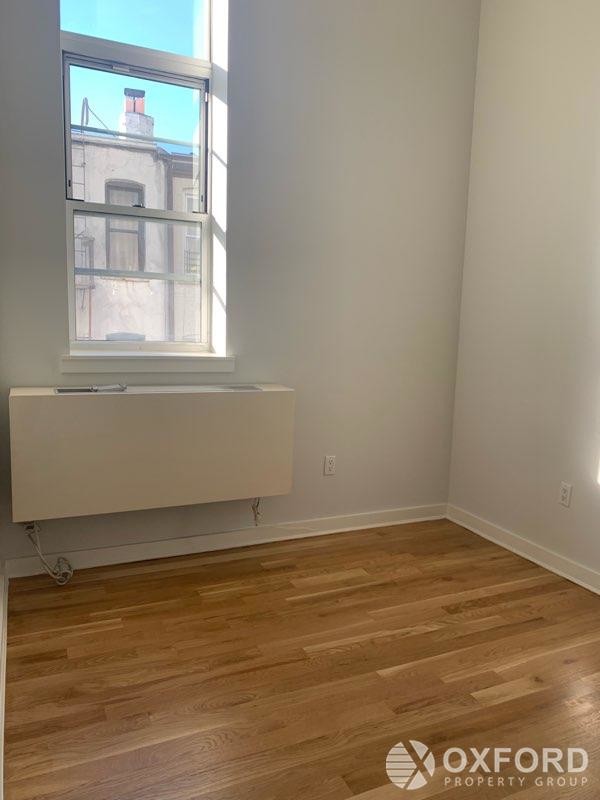 Building Photo - 71-13 60th Lane