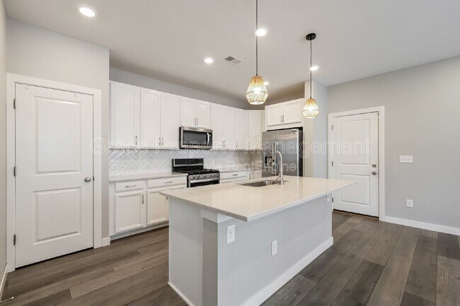 Building Photo - 7584 S Winnipeg Ct