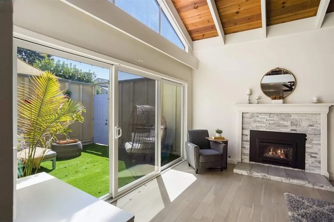 Building Photo - Spacious 1,550 Sq Ft Townhome | 2-Car Garage & High Ceilings w/ Exposed Beams