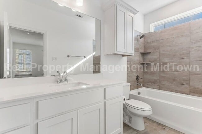Building Photo - Live Elevated in the Heart of Viridian – S...