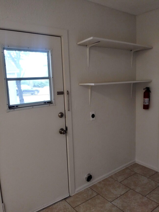 Storage room and Backdoor Exit - 403 Ellana Claire St