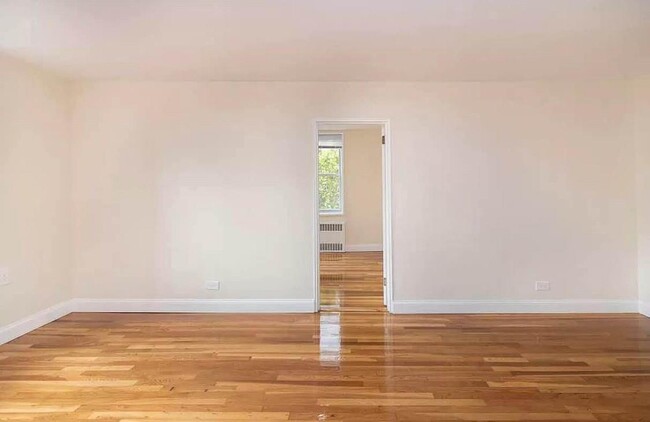 Building Photo - 55-05 Woodside Ave