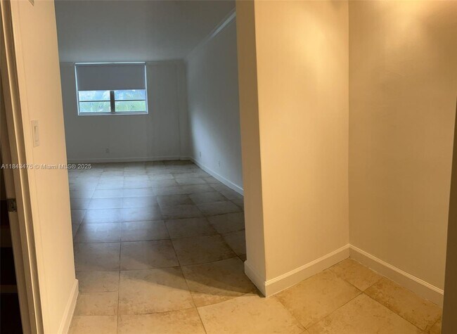 Building Photo - 19390 Collins Ave