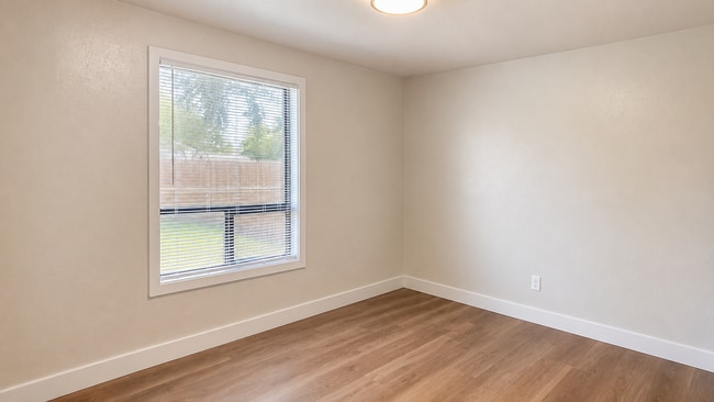 Building Photo - Renovated 3-Bedroom Home with Fenced Yard, Fireplace & In-Unit Laundry