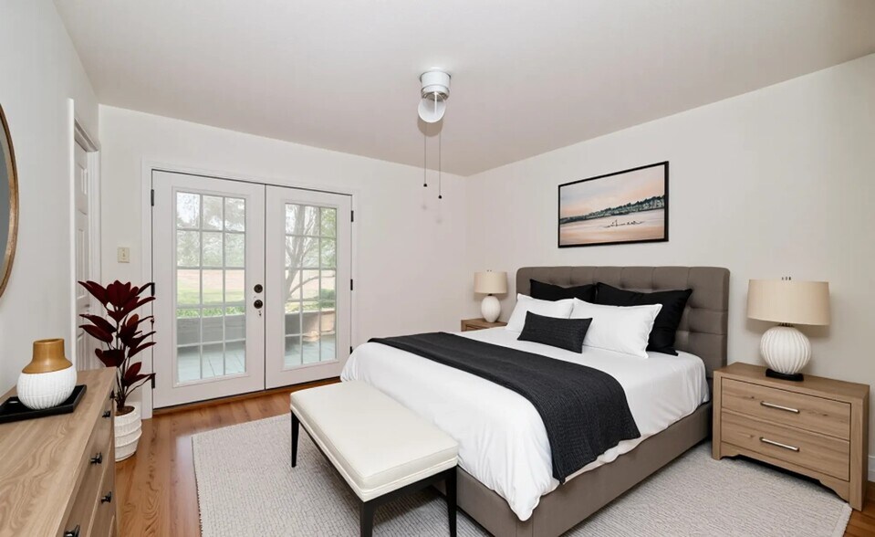 Comfortable guest room or secondary bedroom (virtually staged). - 6812 Uppingham Rd