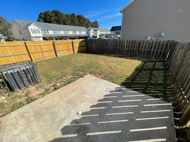 Building Photo - Spacious 4 Bedroom Townhome in Jackson with fenced backyard!