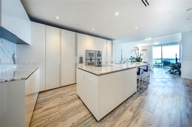 Building Photo - 10203 Collins Ave