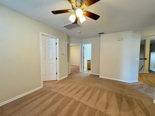 Building Photo - Spacious 4-Bedroom Home with Private Pool and Modern Comforts