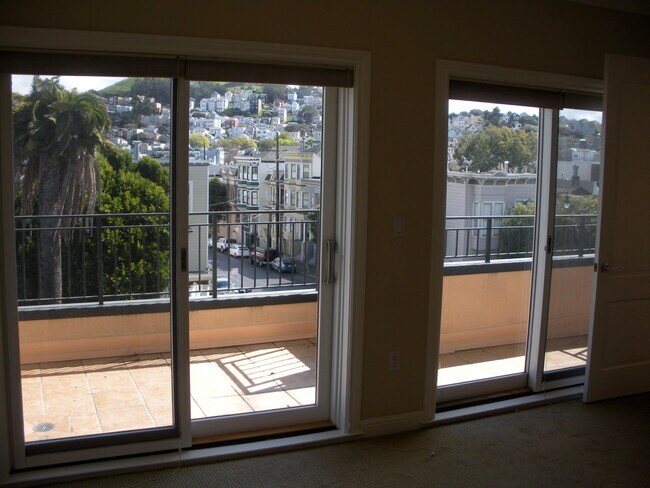 sliding doors to balcony-master bedroom - 1596 Dolores St