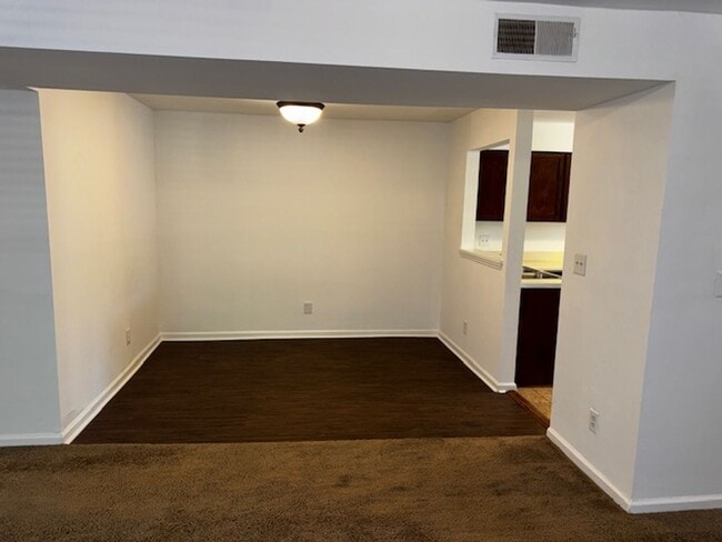 Building Photo - Charming 2-Bedroom Condo in a Peaceful, Tree-Lined Community – Minutes from Uptown Charlotte