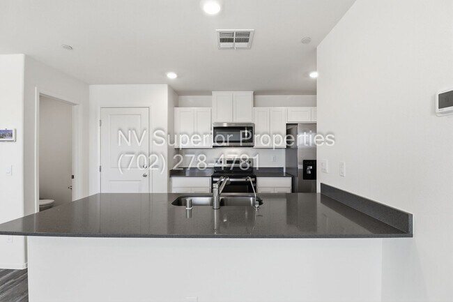 Building Photo - Aliante!! Never lived in!!! Gated!! Community Pool!!! Playground!! 2 Car Garage!! Tankless Hot wa...