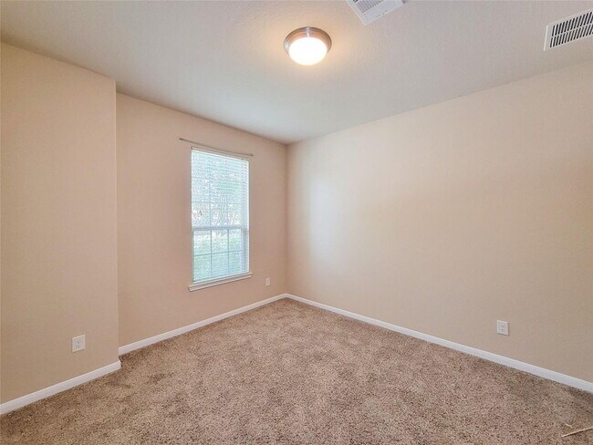 Building Photo - "Charming 3-Bed, 2-Bath Retreat in Humble, TX – Your Perfect Home Awaits on Justin Ridge Ln!"