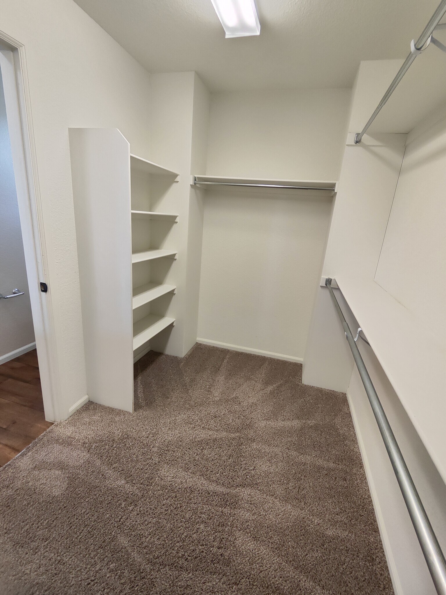 Master closet with built-in storage - 17778 E 44th Ave