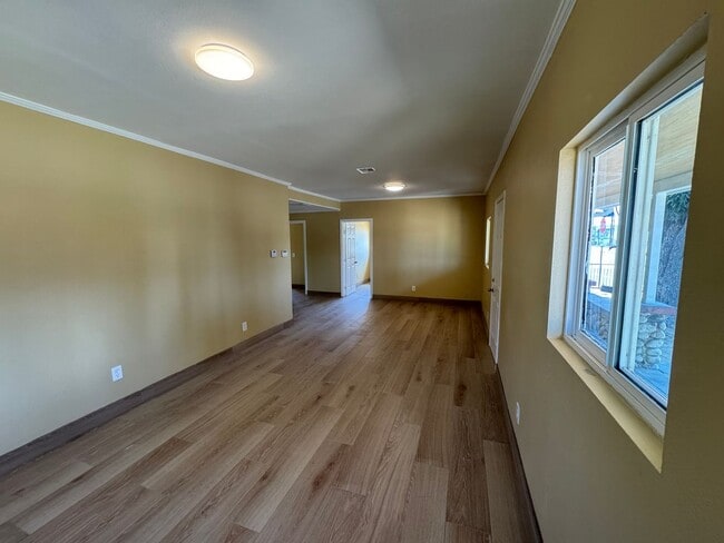 Building Photo - Newly Renovated 3 Bed, 3 Bath Ground Floor Unit in the Heart of Pomona; Modern, Efficient, and Mo...
