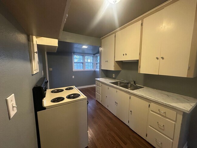 Building Photo - Two bedroom, One and half bathroom house, with additional living room, and bonus room!