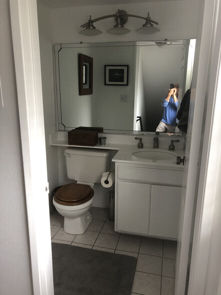 Powder room (ignore the man in the mirror) - 12458 Weddington St