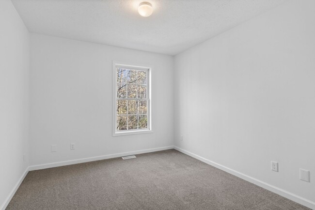 Building Photo - Charming 3+ Bedroom Cape Cod with Water View – Between Traverse City & Suttons Bay