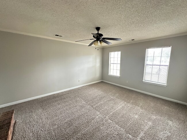 Building Photo - MOVE-IN READY! 3BR/2BA in Quiet Cove | Brick Fireplace | Fenced Yard & Patio!