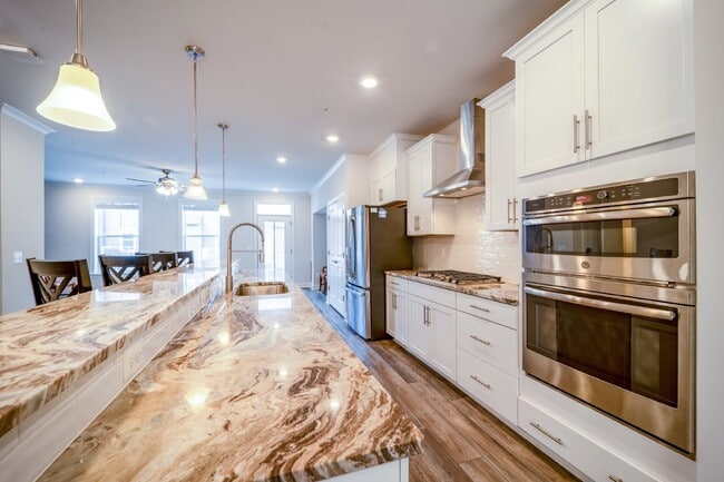 Building Photo - Modern Kincora Townhome-Style Condo | 3 Bedrooms | EV Charging | Backing to 165 Acres of Conserva...