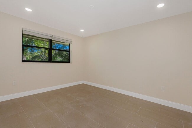 Building Photo - Fully Renovated Corner 1/1 “Villa” with Ba...