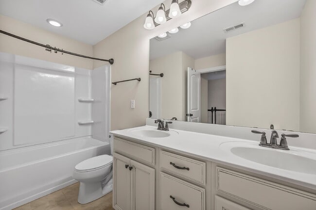 Building Photo - Your Next Home Awaits! 3BR Townhome with G...