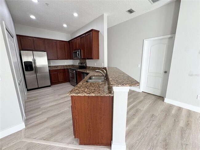 Building Photo - 10703 Yellow Tiger Lily Dr