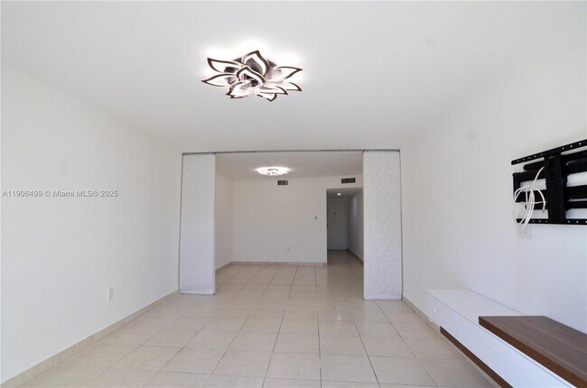 Building Photo - 9911 W Okeechobee Rd